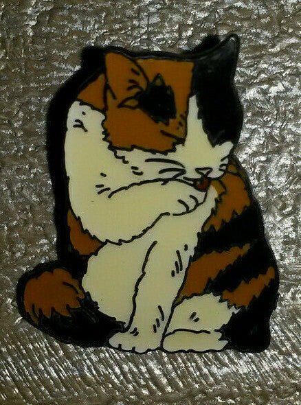 Cat Black and White and Brown licking its Paws Pin