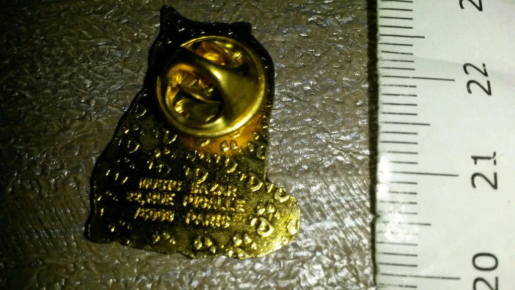 Cat Black and White licking its Paws Pin