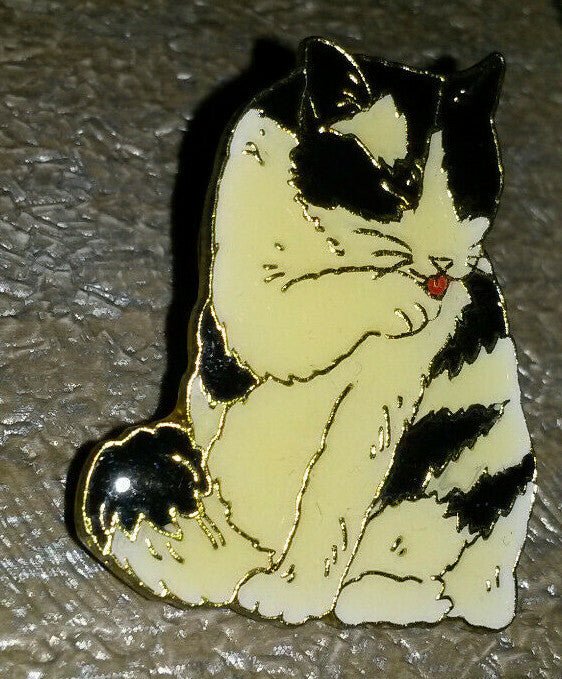 Cat Black and White licking its Paws Pin