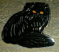 Cat Black posing with orange eyes Pin
