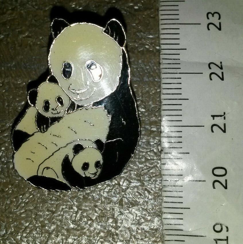 Panda Bear holding its babies baby Pin