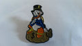 Scrooge McDuck sitting on money bag Picsou European Disney pin